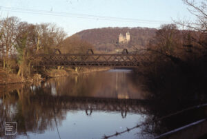 Iron bridge tramway, Castle Coch folly from M4 on Taff, January 1985