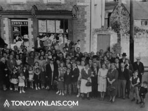 Old photo of shop on Mill Road, Tongwynlais with crowd of people posing